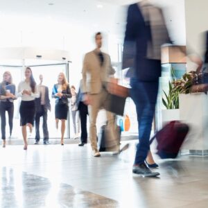 People Walking into a building